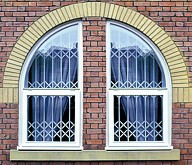 Seceuroguard grilles behind arched windows